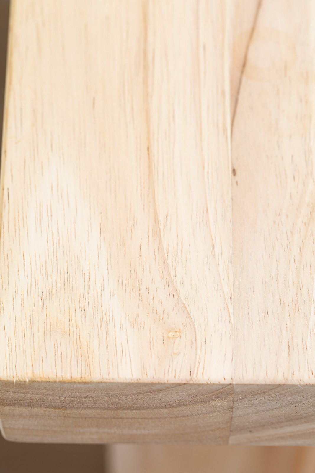 close up of wood grain top on kitchen island before getting finished with Polycrylic Max.