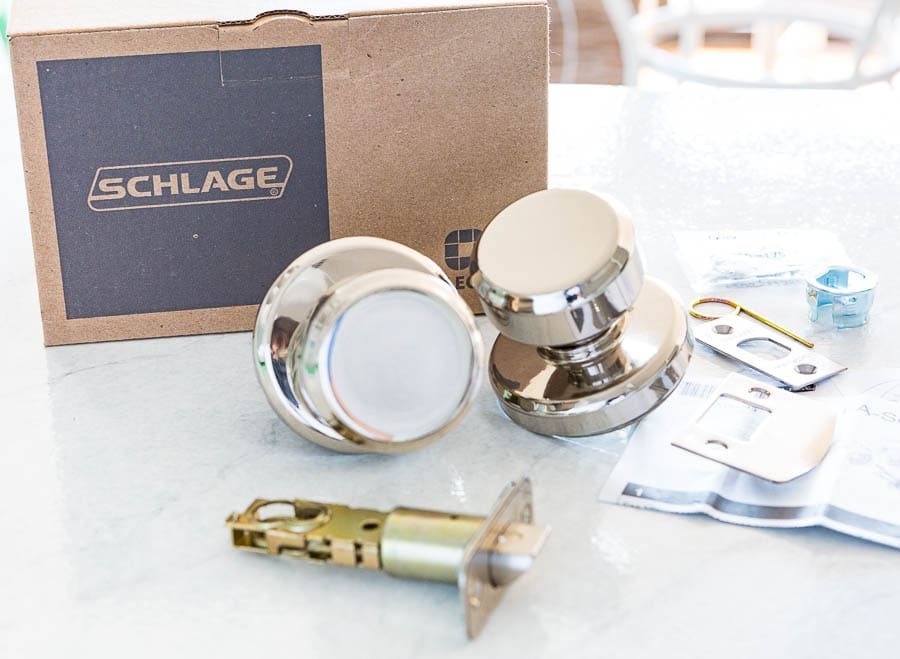 Schlage Bowery Doorknobs with Greyson Trim in Polished nickel