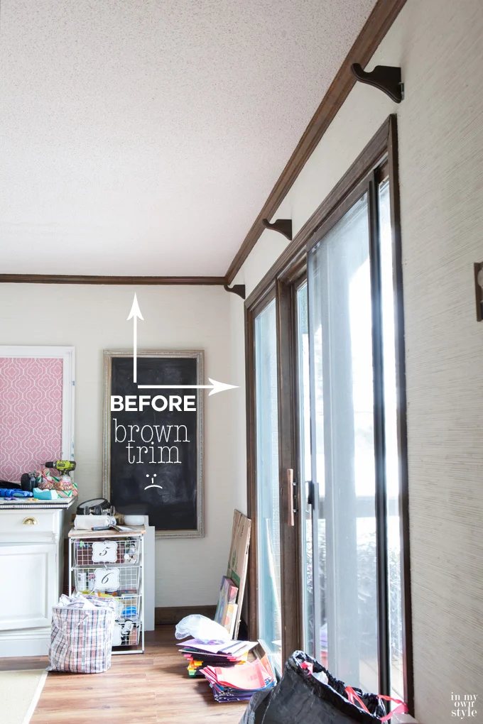 How to paint over dark stained trim