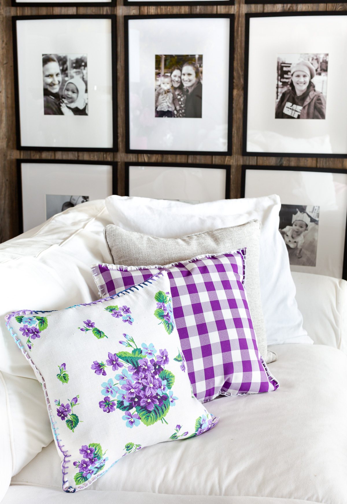 Purple and white old cloth napkins made into DIY throw pillows.