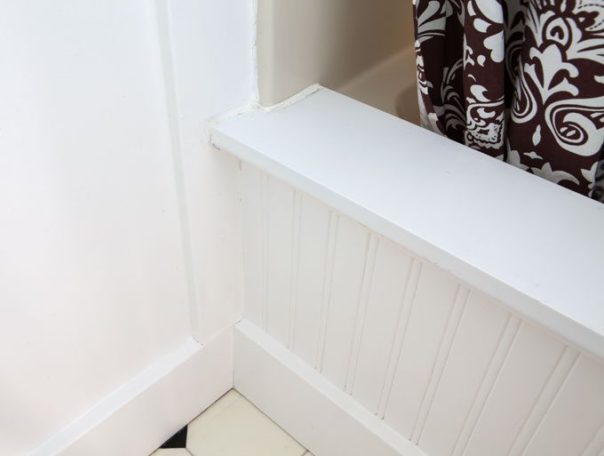 How to add half wall and molding in front of a bathtub