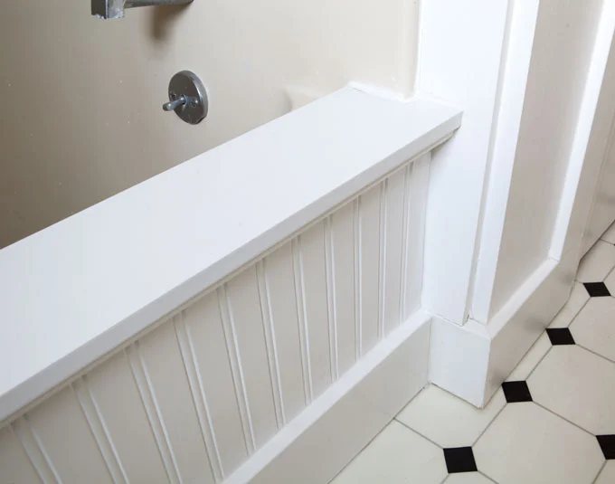 How to add half wall and molding in front of a bathtub