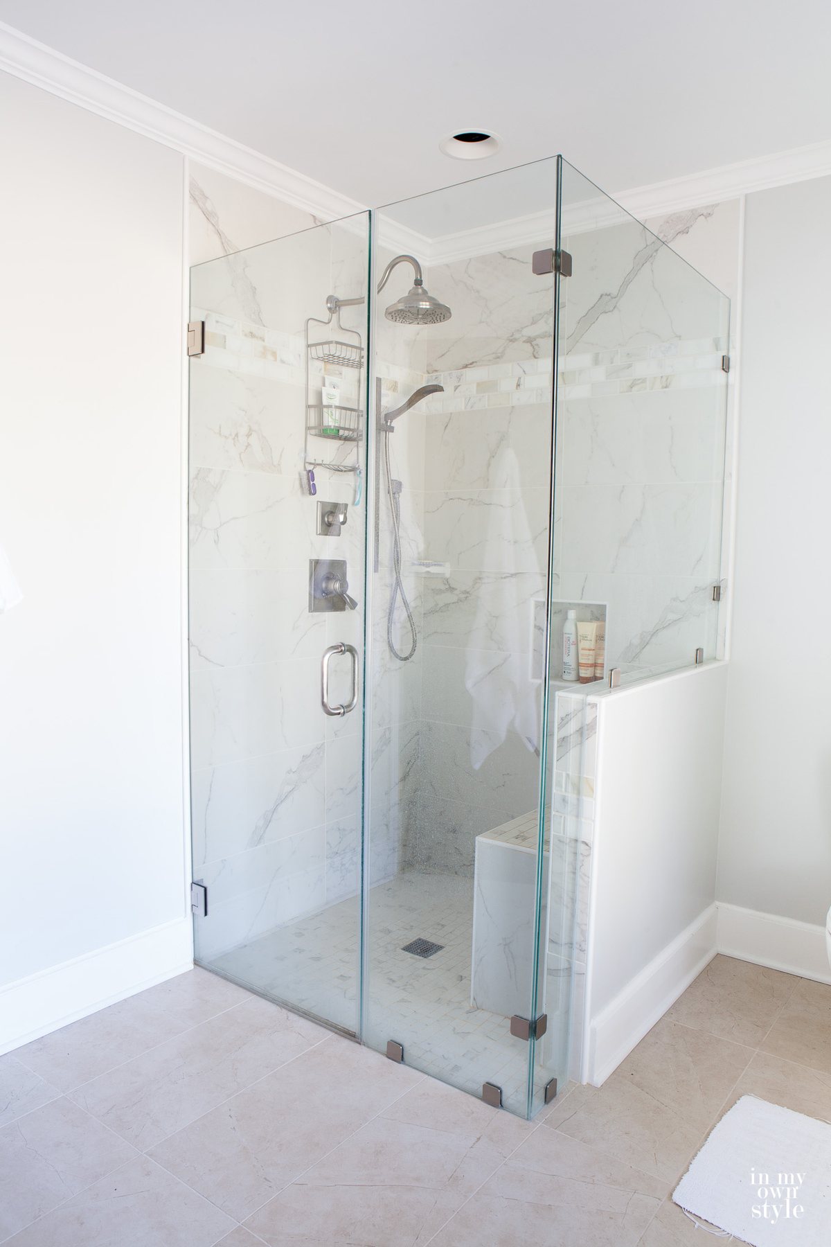 Glass surround shower enclosure