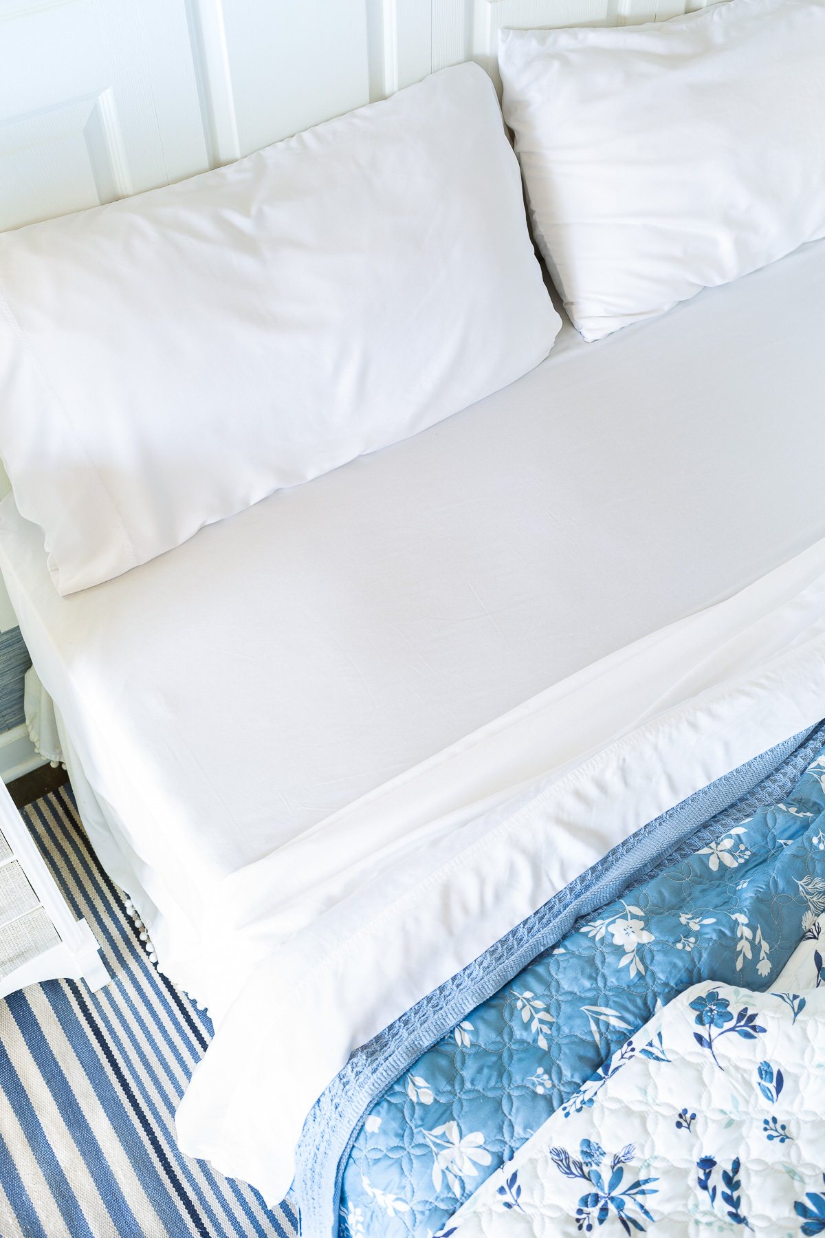 Bedsure Bamboo Sheets in white on a master bedroom bed.