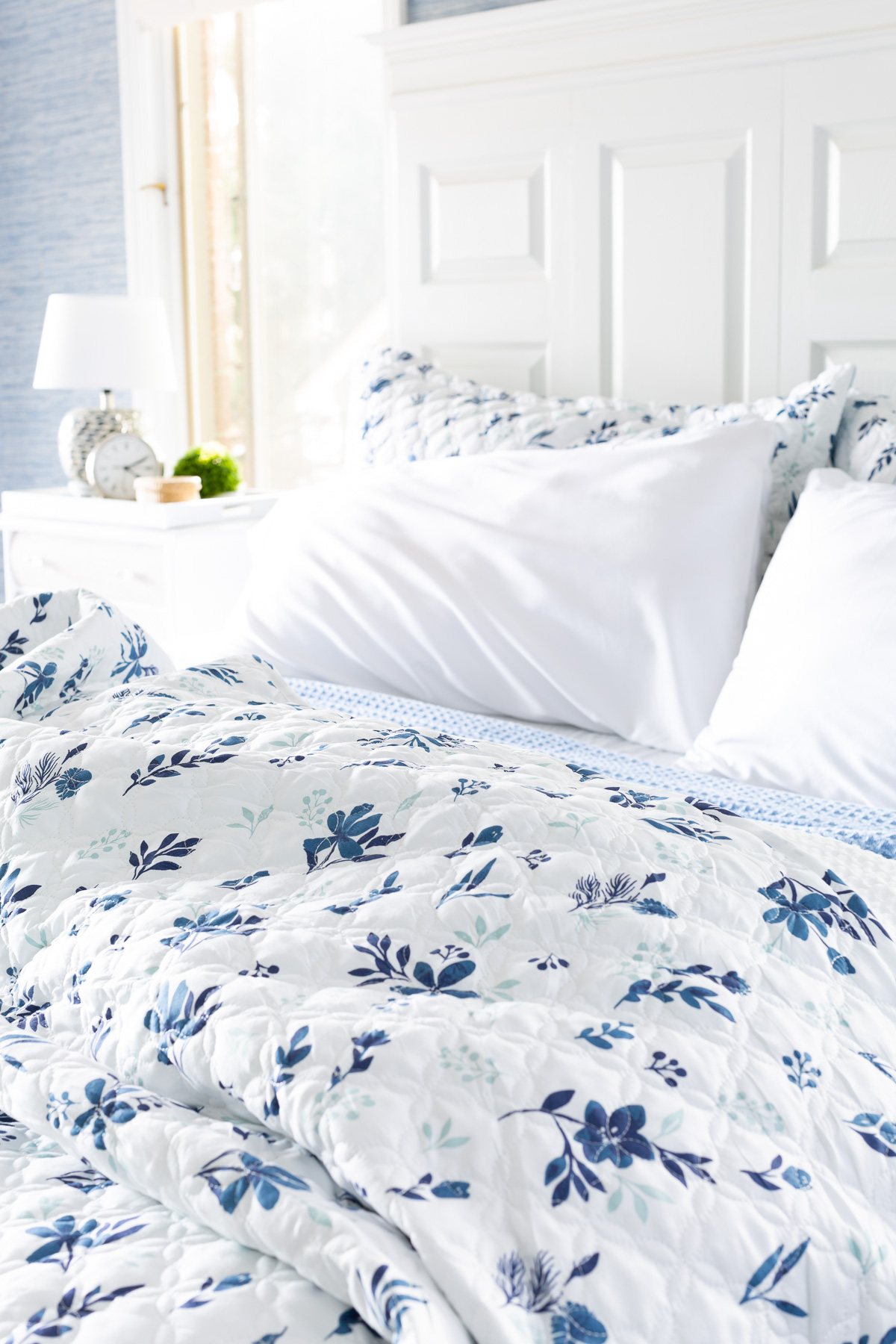 Bedsure pillowcases and bedding on bed in blue and white.