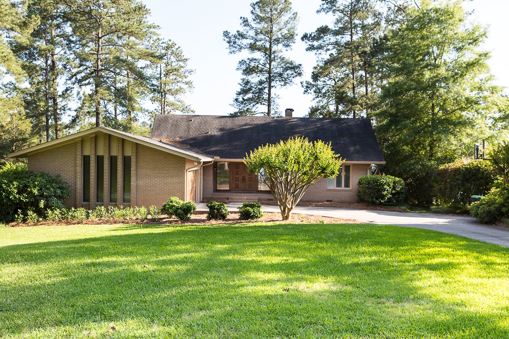 Front of house in dabbled shade