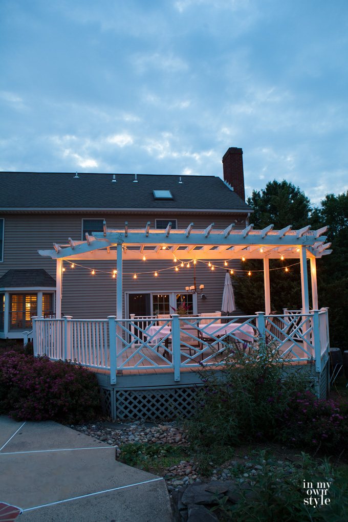 Vintage bulb string lights on a deck