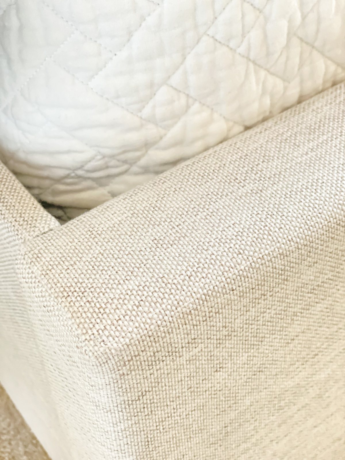 close up of Eastman bed frame in the color oat.