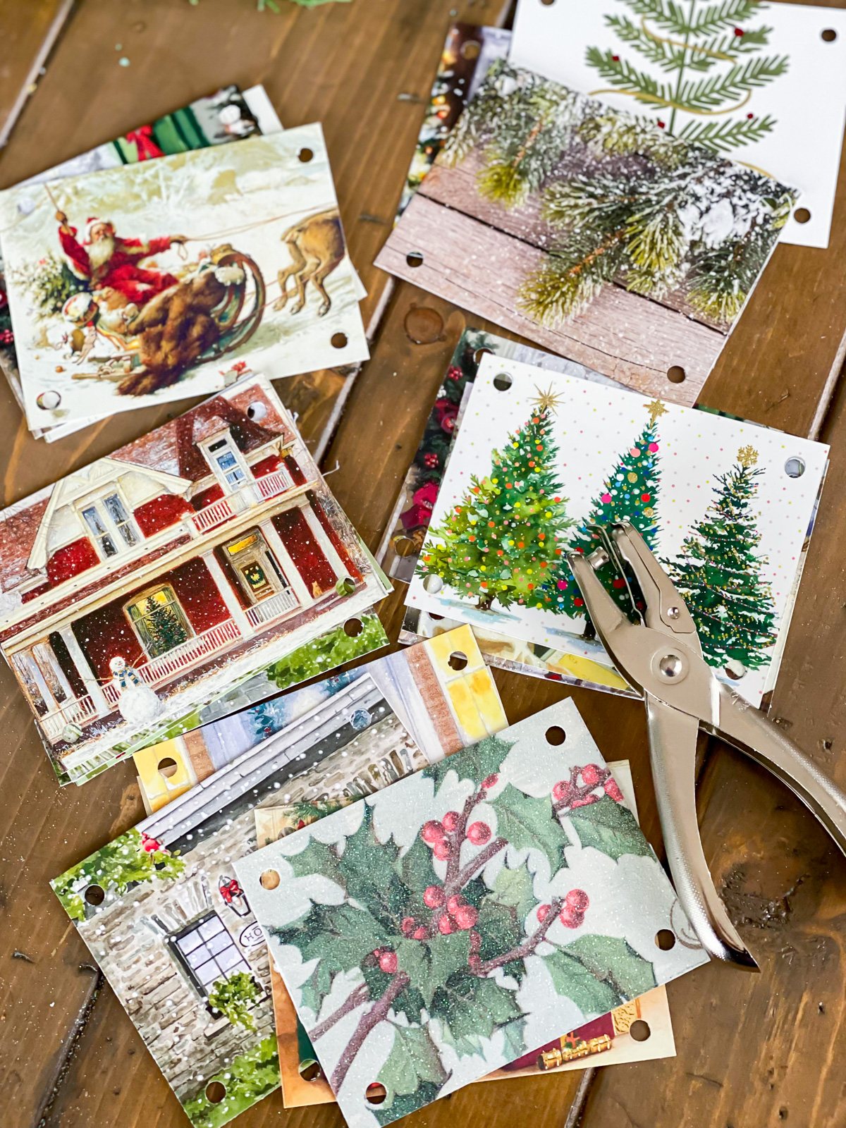 Cut out and punch holes in Christmas cards