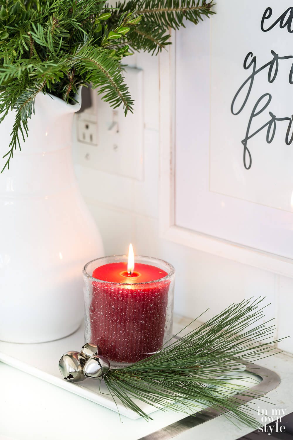 red Christmas candle in kitchen