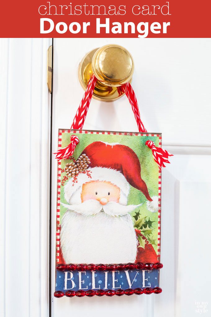 Merry in minutes...make this Christmas door hanger using a favorite Christmas card and some ribbon. | Oducu