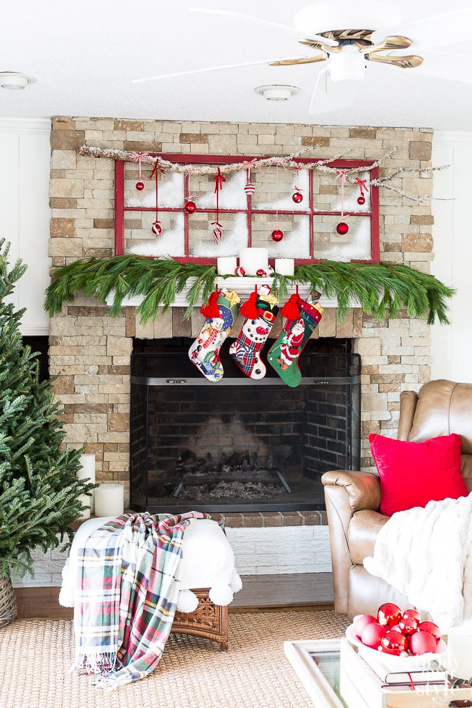 Living room holiday mantel decorating idea