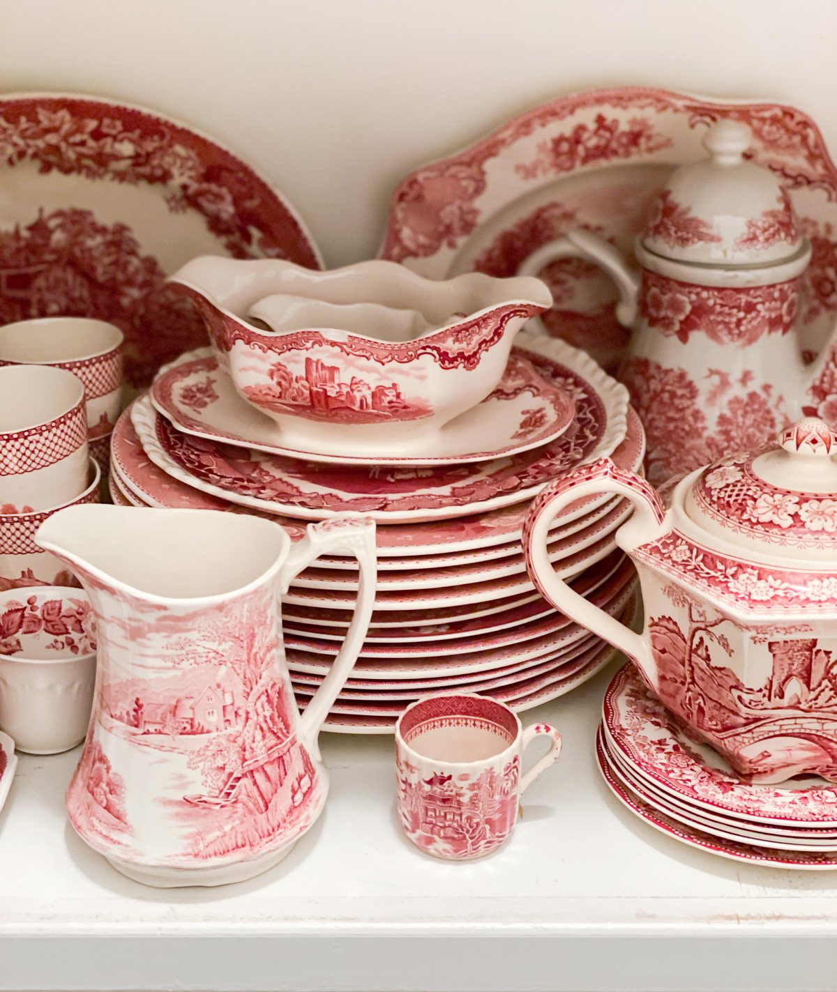 Red and white vintage china in china closet