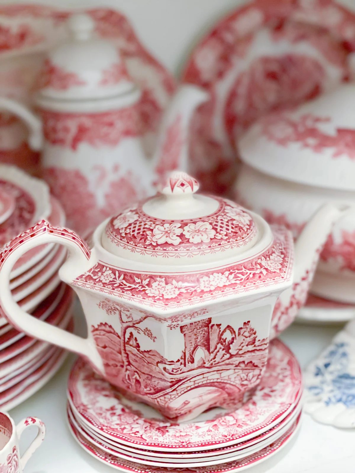 Red and white vintage china in china closet