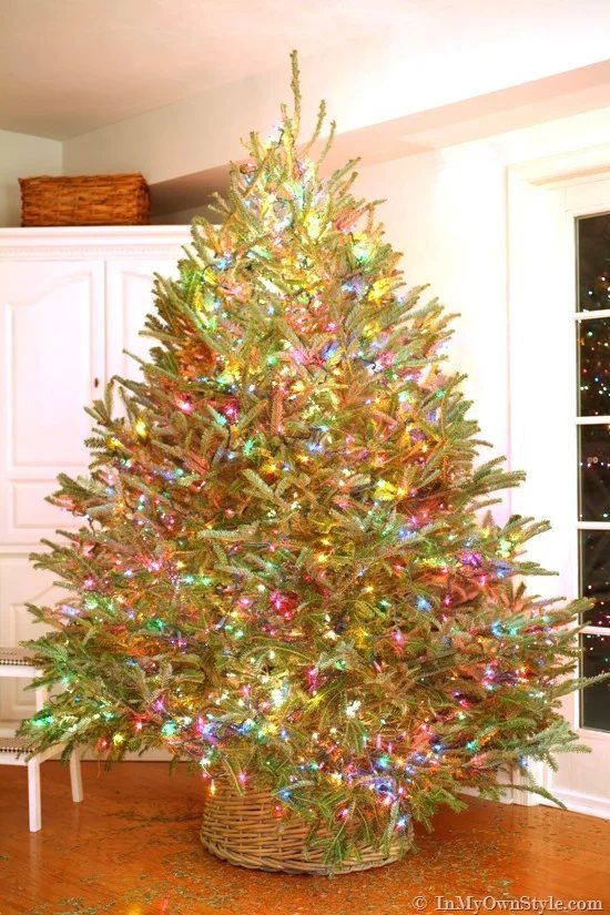 finished Christmas tree lit with colorful lights