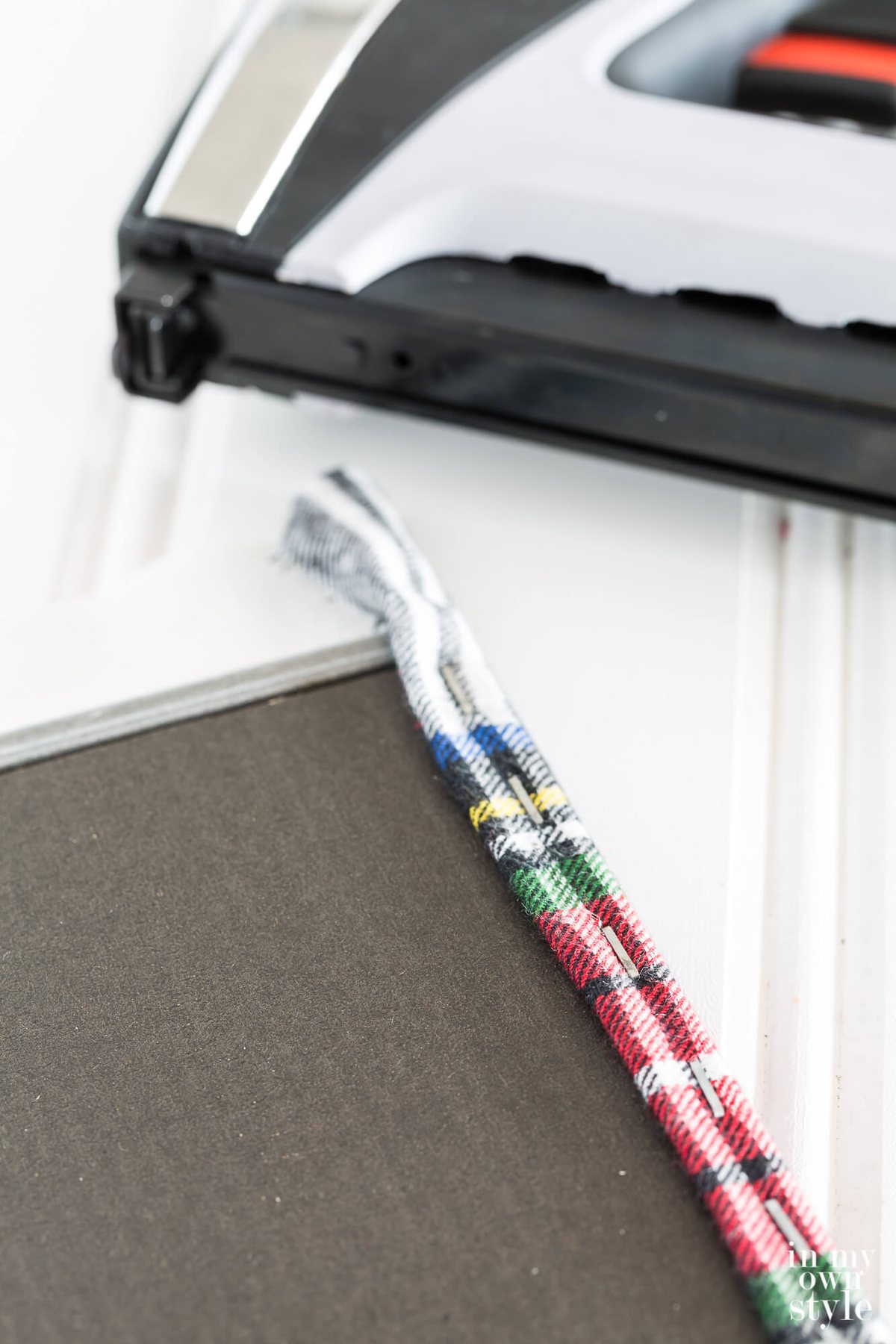 How to staple fabric on a frame to make a tree stand cover