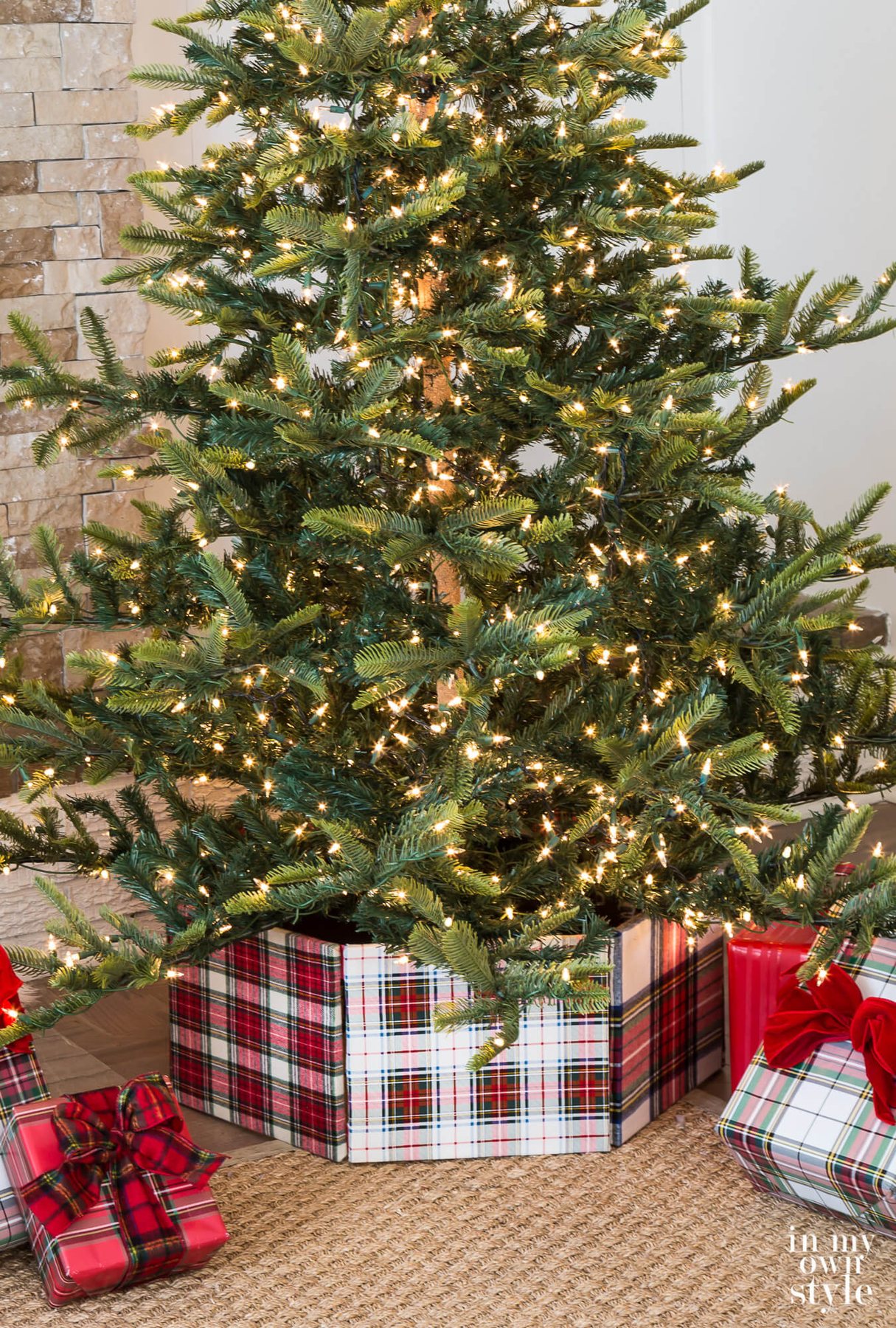 DIY Christmas tree collar made using plaid fabric wrapped frames.