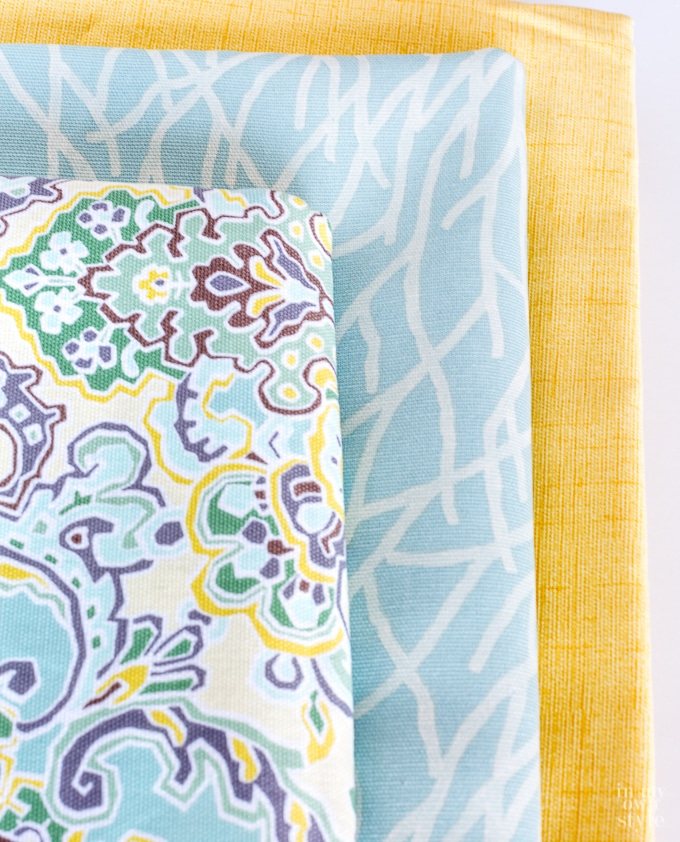 Coastal color fabrics used for a dresser drawer makeover