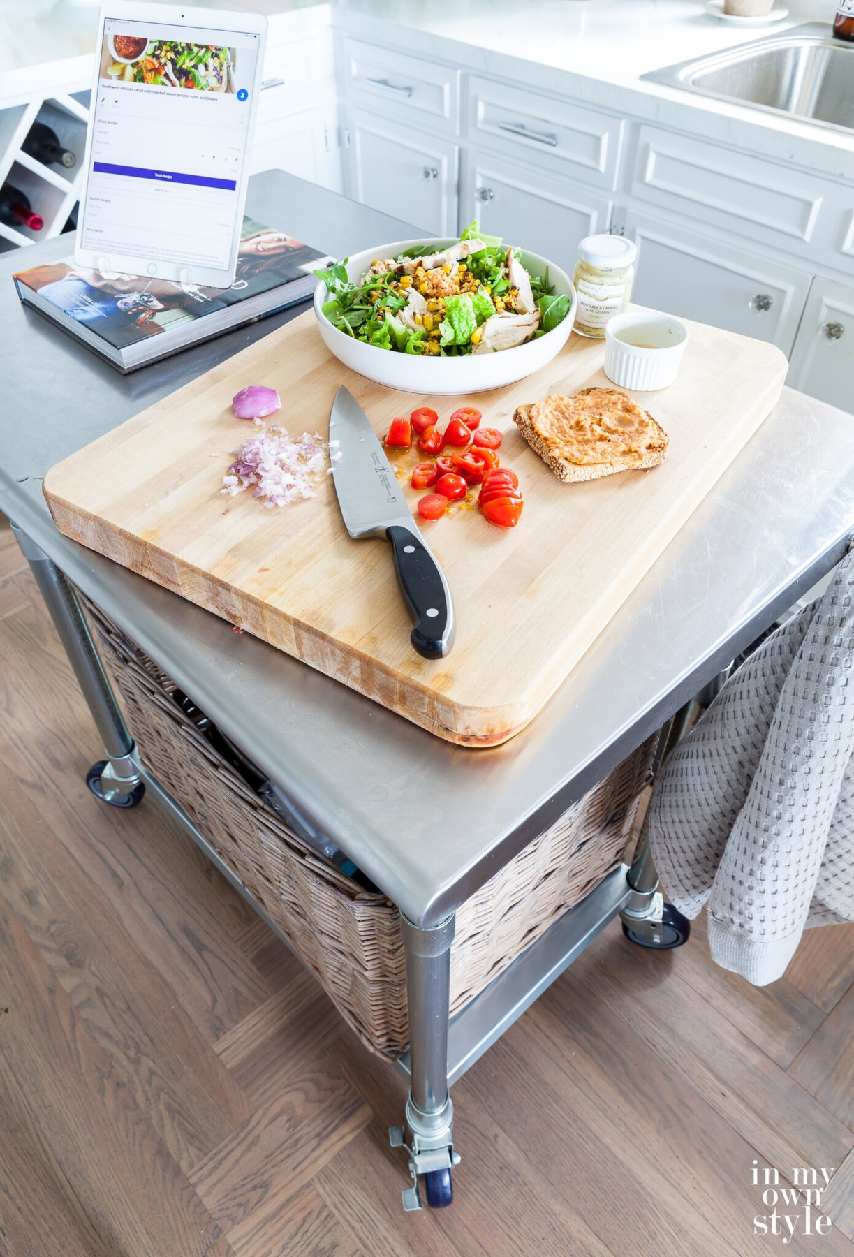 My rolling metal kitchen cart got a makeover. Now it has two shelves and a cutting board.