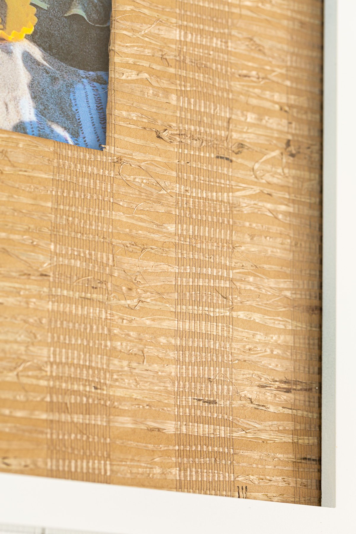 close up of grasscloth mat in frame