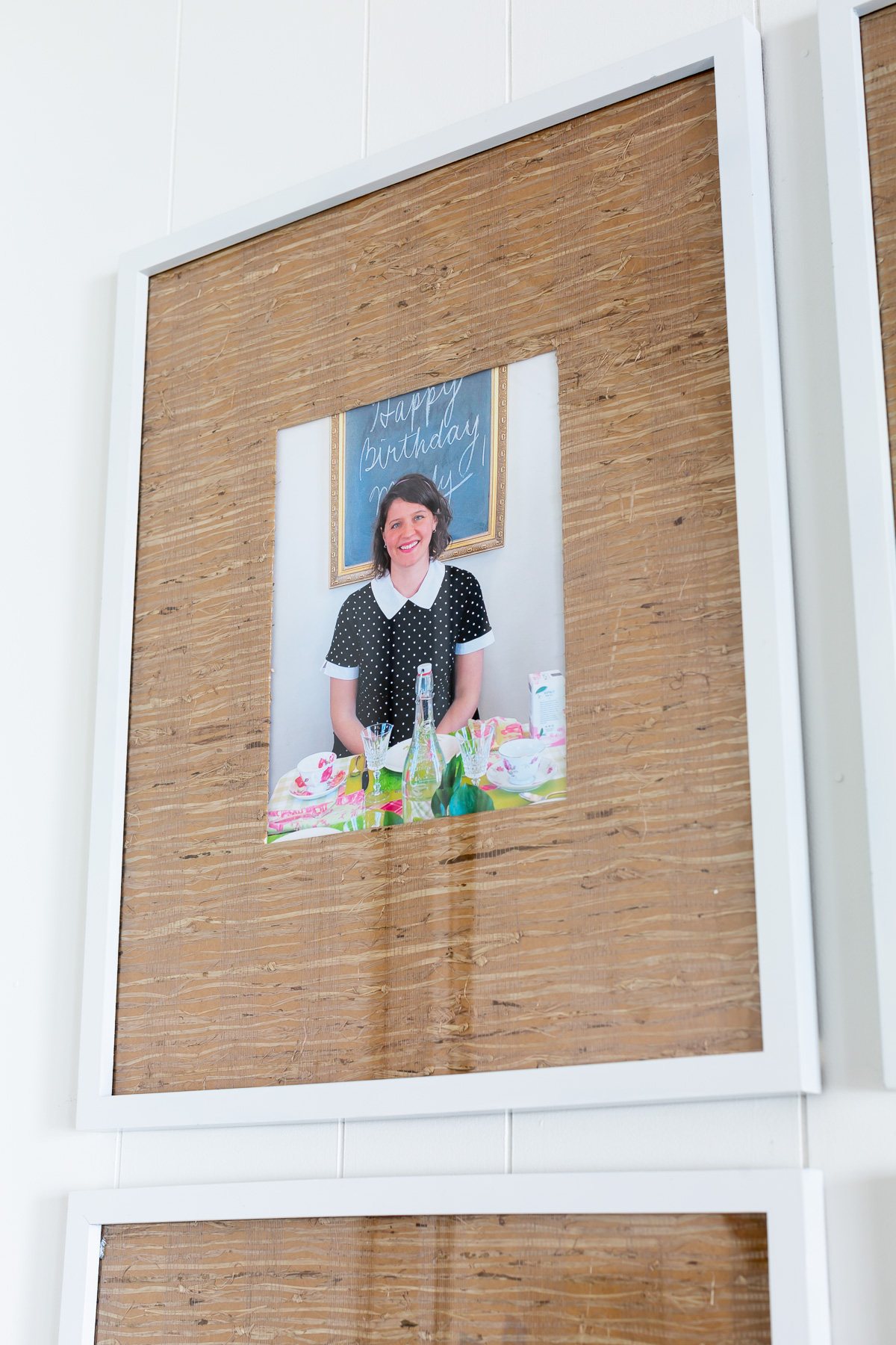 photo of pretty girl in a frame with wallpaper made into a mat for the frame.