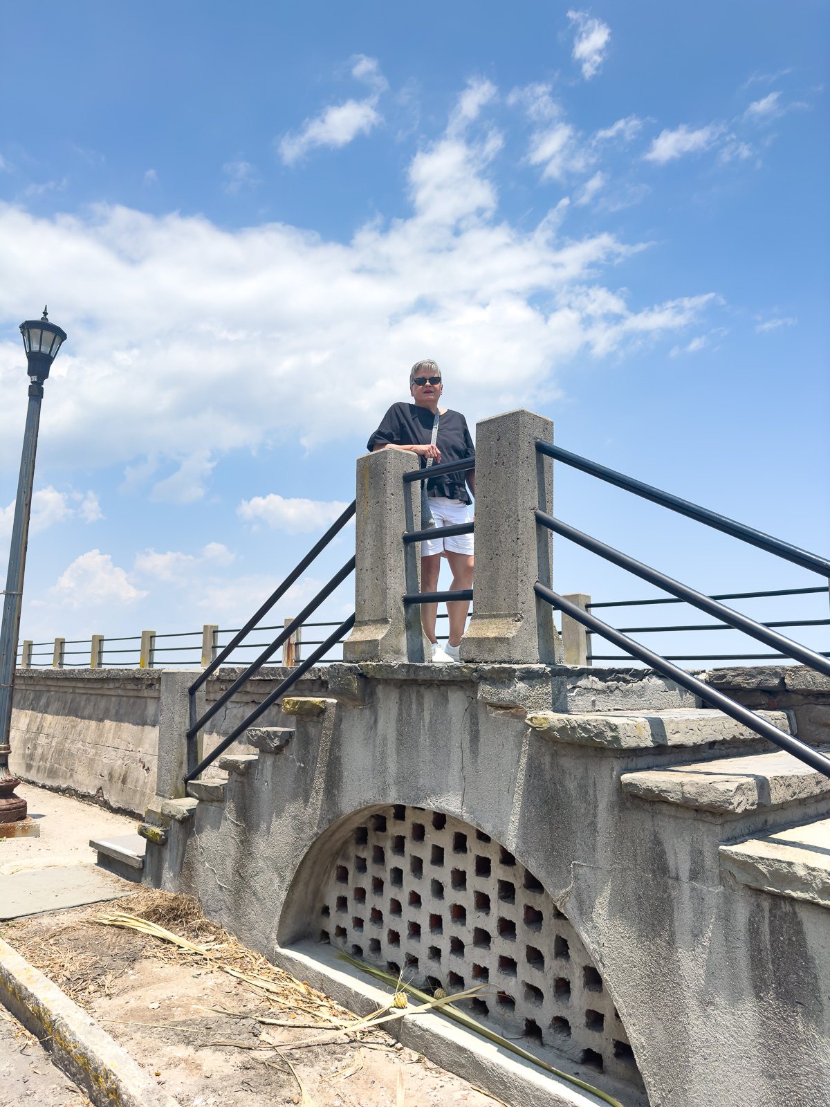 My sister on the Charleston harbor walkway