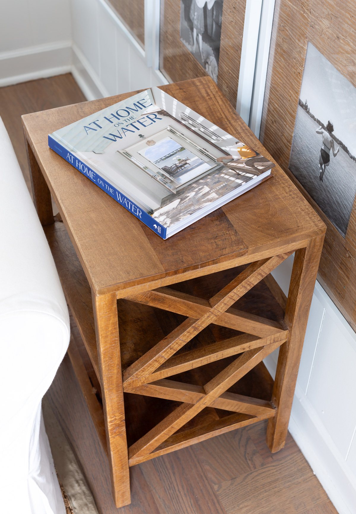side table with X design from HomeGoods. Book on top At Home on the Water.