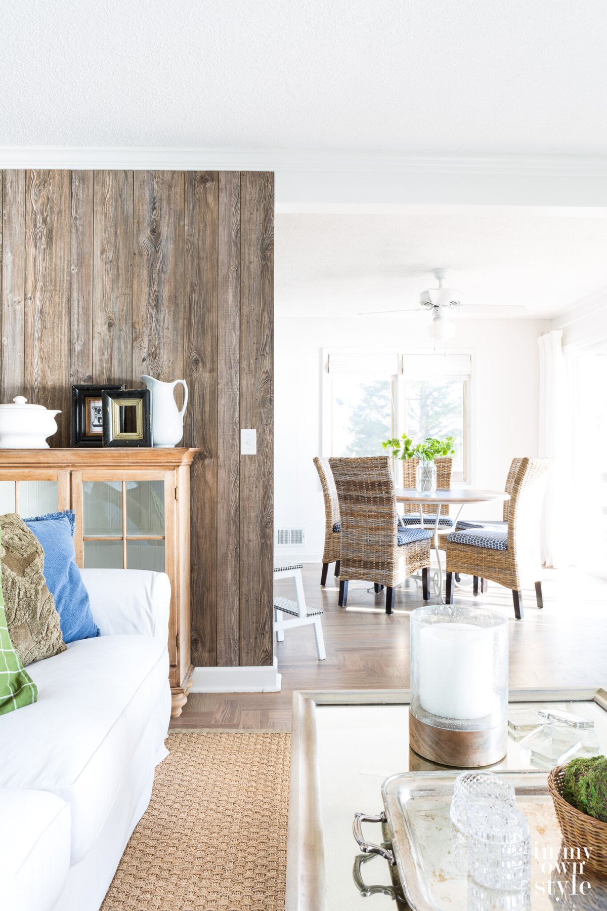Barnwood Grey paneling added as an accent wall in a modern rustic white and woodsy decor