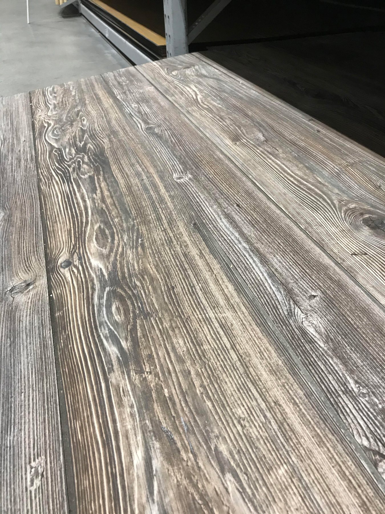 A sheet of Fake barnwood paneling bought at Lowes