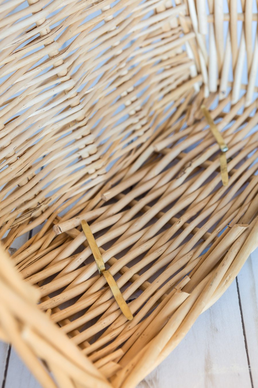 inside a basket with brass fasteners