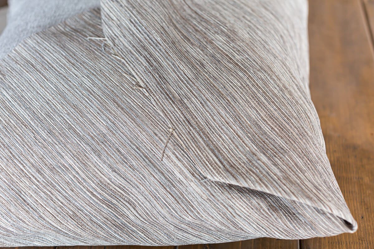 raw edge on fabric wrapped pillow
