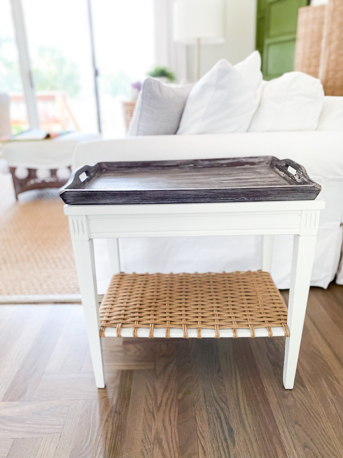 dark wood tray on top of white painted diy end table makeover