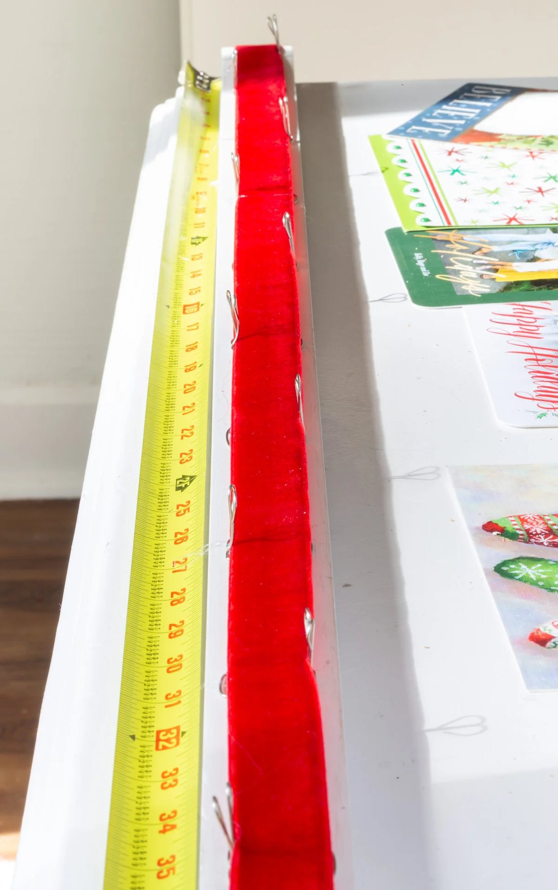 How to attach ribbon to wood when making card holder.