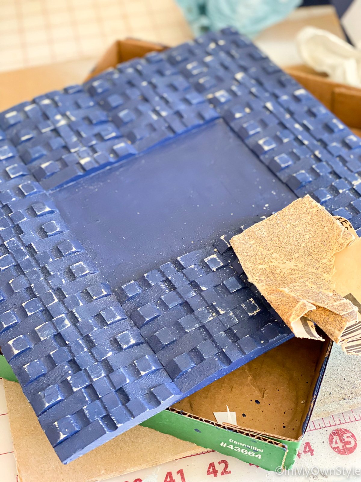 sanding painted clothespin picture frame