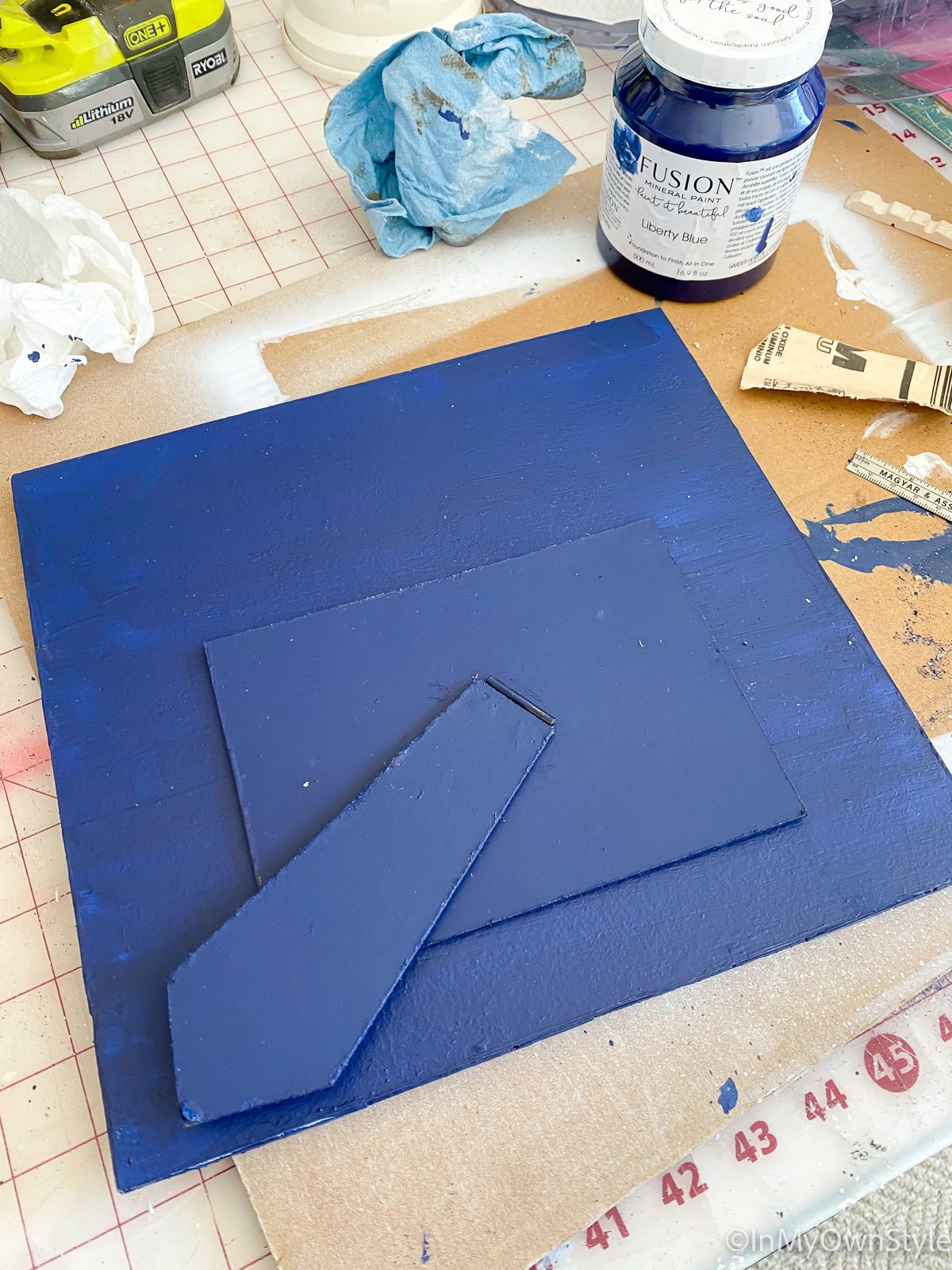 Back of diy clothespin picture frame painted using Liberty Blue from Fusion Mineral Paint