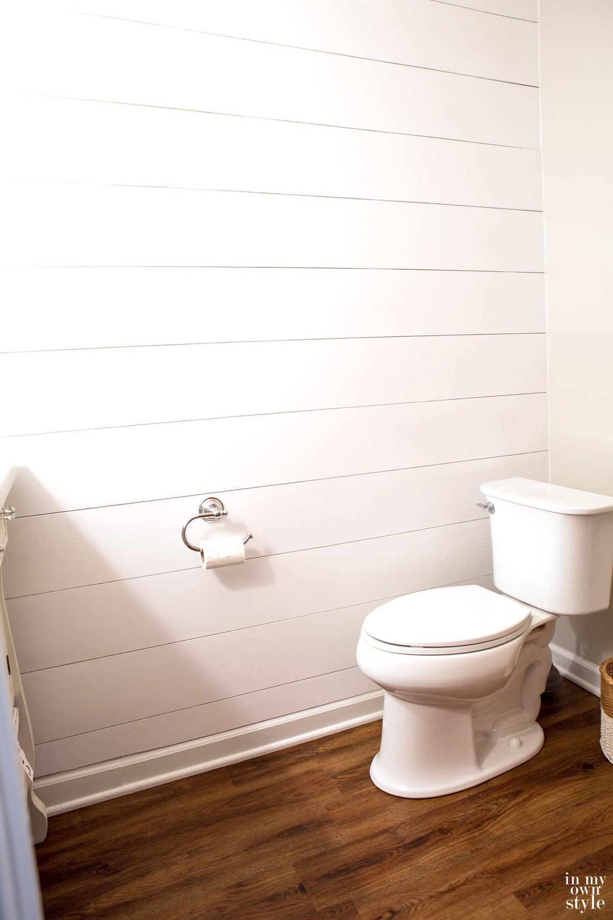 powder-room-with-wide-planked-walls