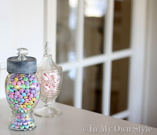 glass canister filled with pastel Easter candies