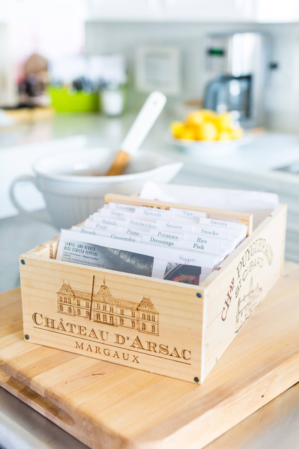 Completed repurposed wine crate recipe box on kitchen island.