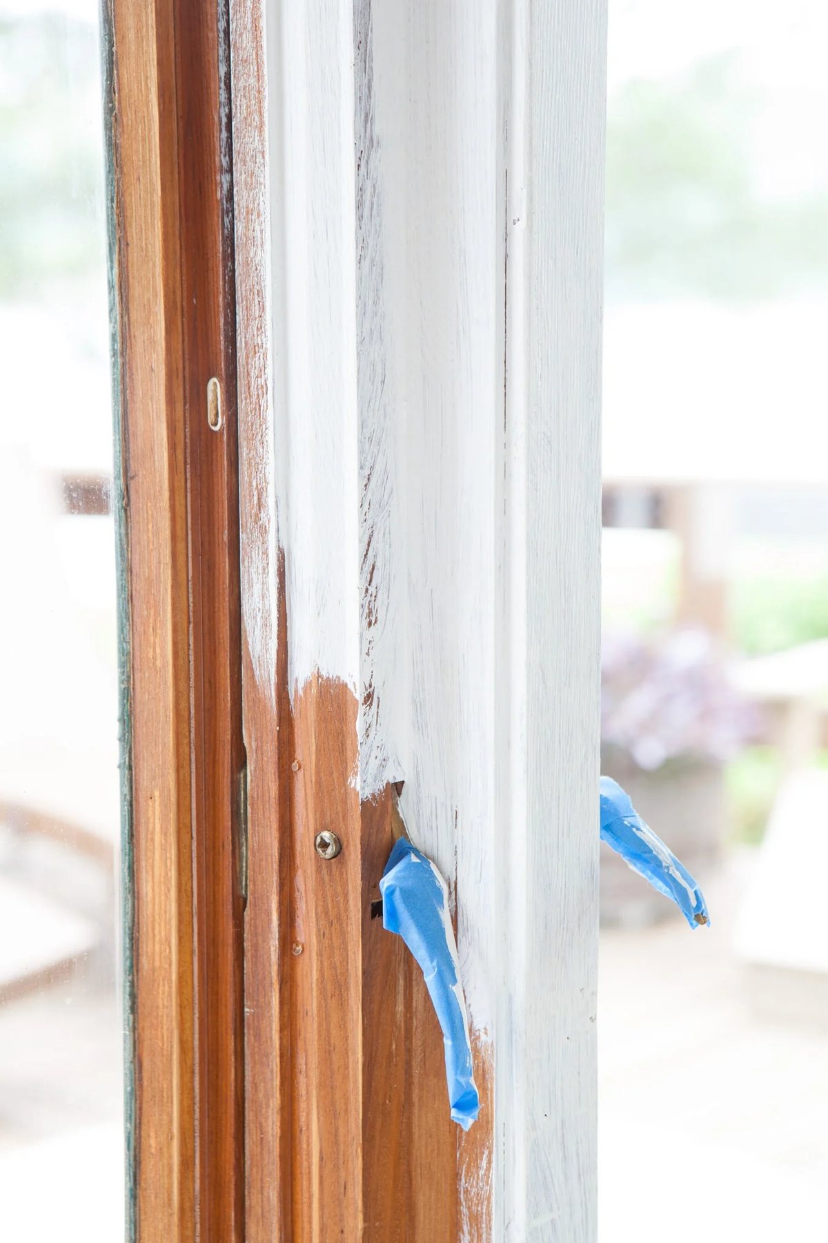 how to paint over stained wood