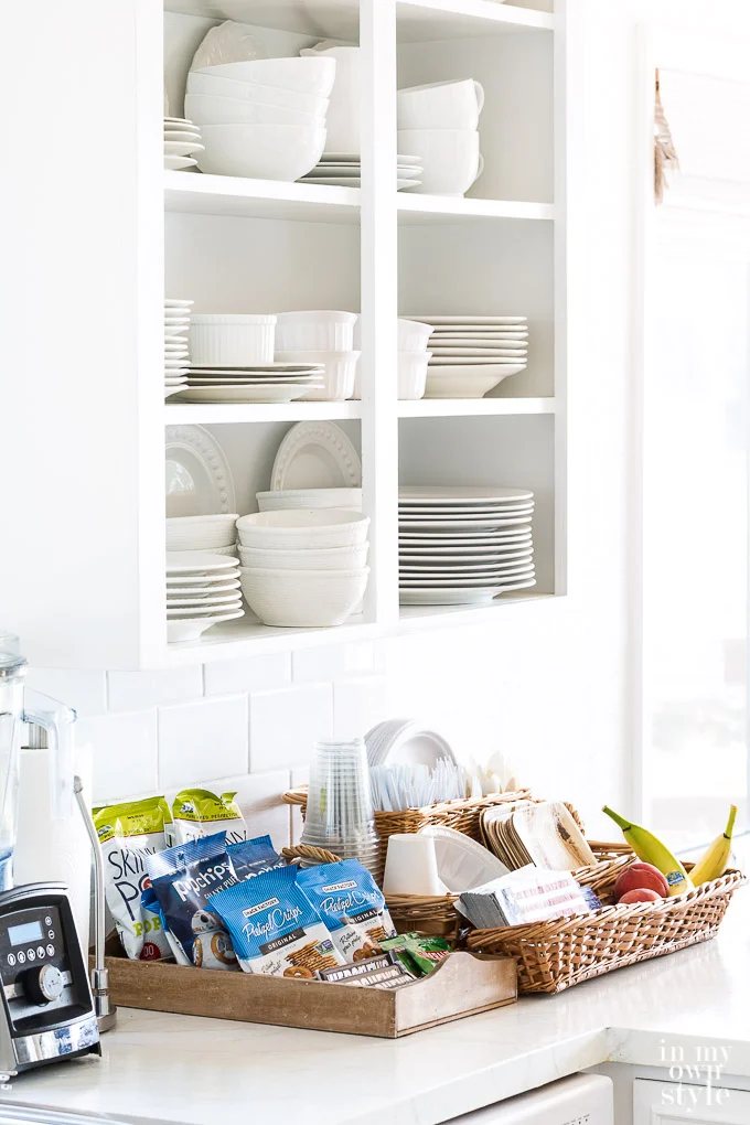 Snacks and food ideas for overnight guests placed on kitchen counter