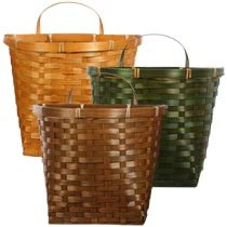 Dorm bed storage and organizing idea using flat backed baskets.