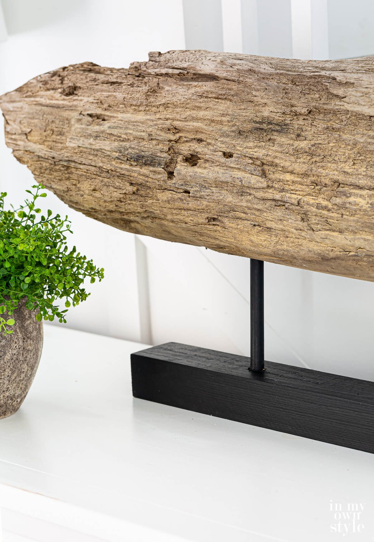 Natural wood cut on stand for tabletop modern decor.