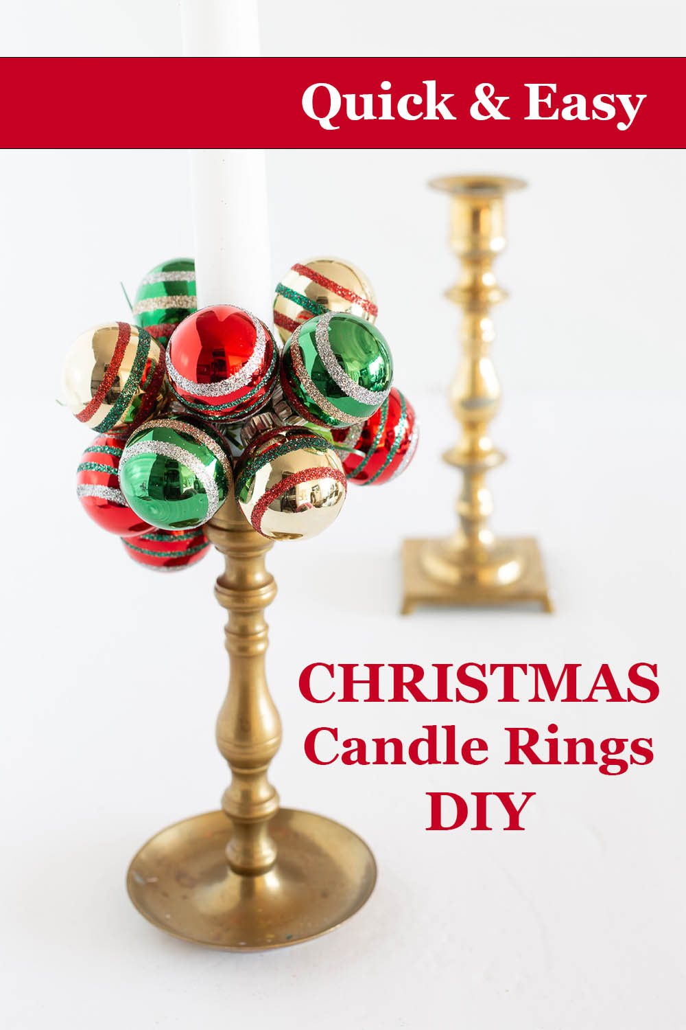 brass taper candle holder with gold, red and green mini Christmas ornaments wrapped around it. Text overlay says quick and easy Christmas candle rings DIY.