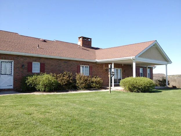 brick-ranch-house-before-backyard-view