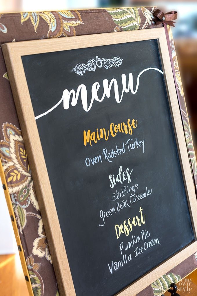 Thanksgiving decorating with fabric projects. Make this fabric covered framed chalkboard for your kitchen or dining room.