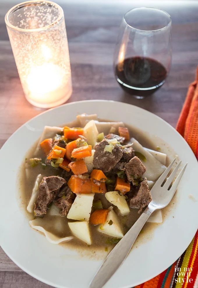 white plate filled with Beef stew for dinner