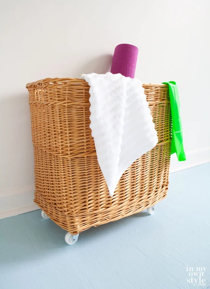 Basket for fitness room towel storage with wheels added.