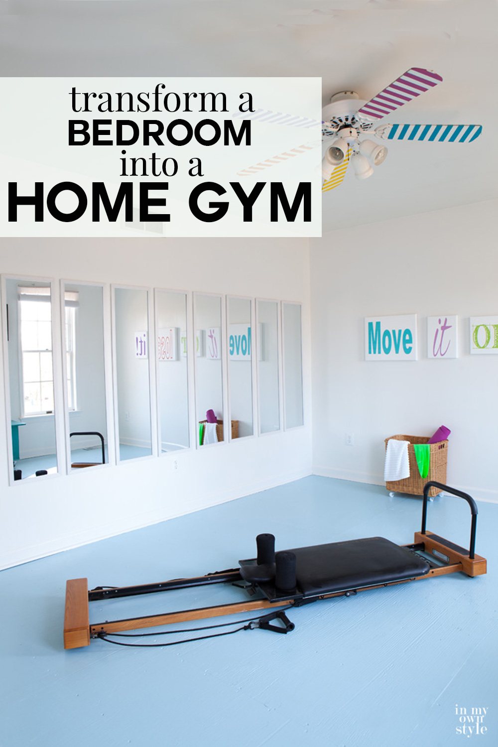 Bedroom turned into a spacious fitness room with full length mirrors on the wall.