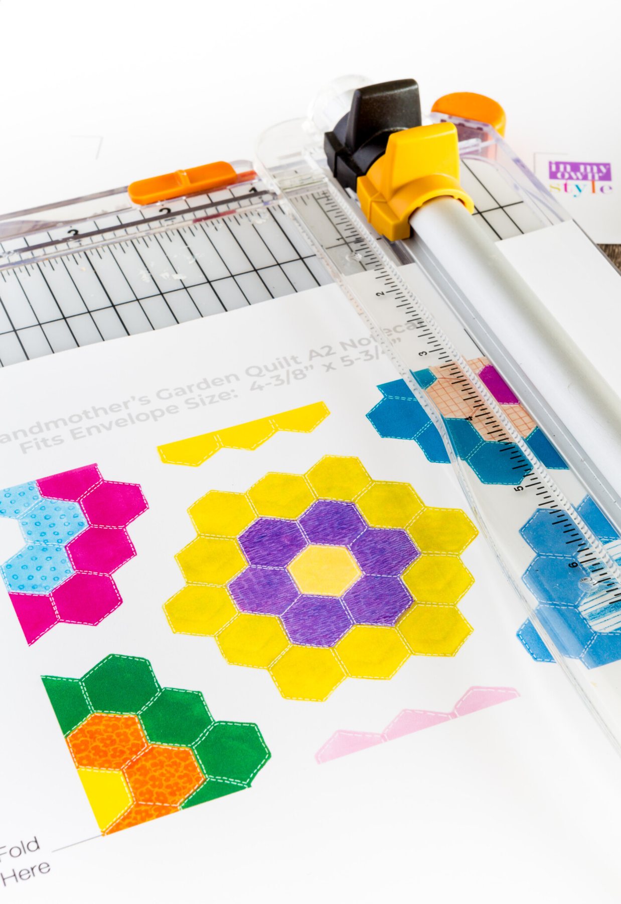 how to cut a free printable note card using a desk top Fiskars paper cutter.