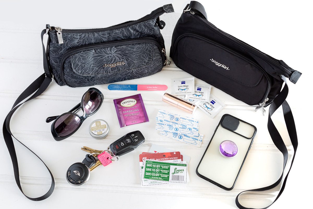 Contents of my Baggallini Everyday Bag. Showing the bag in a grey print and another solid black.